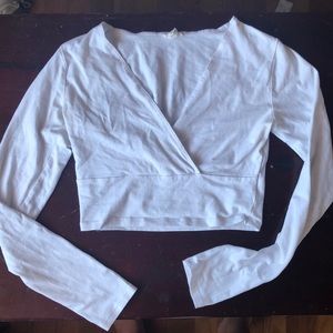 GARAGE White long sleeve crop top.